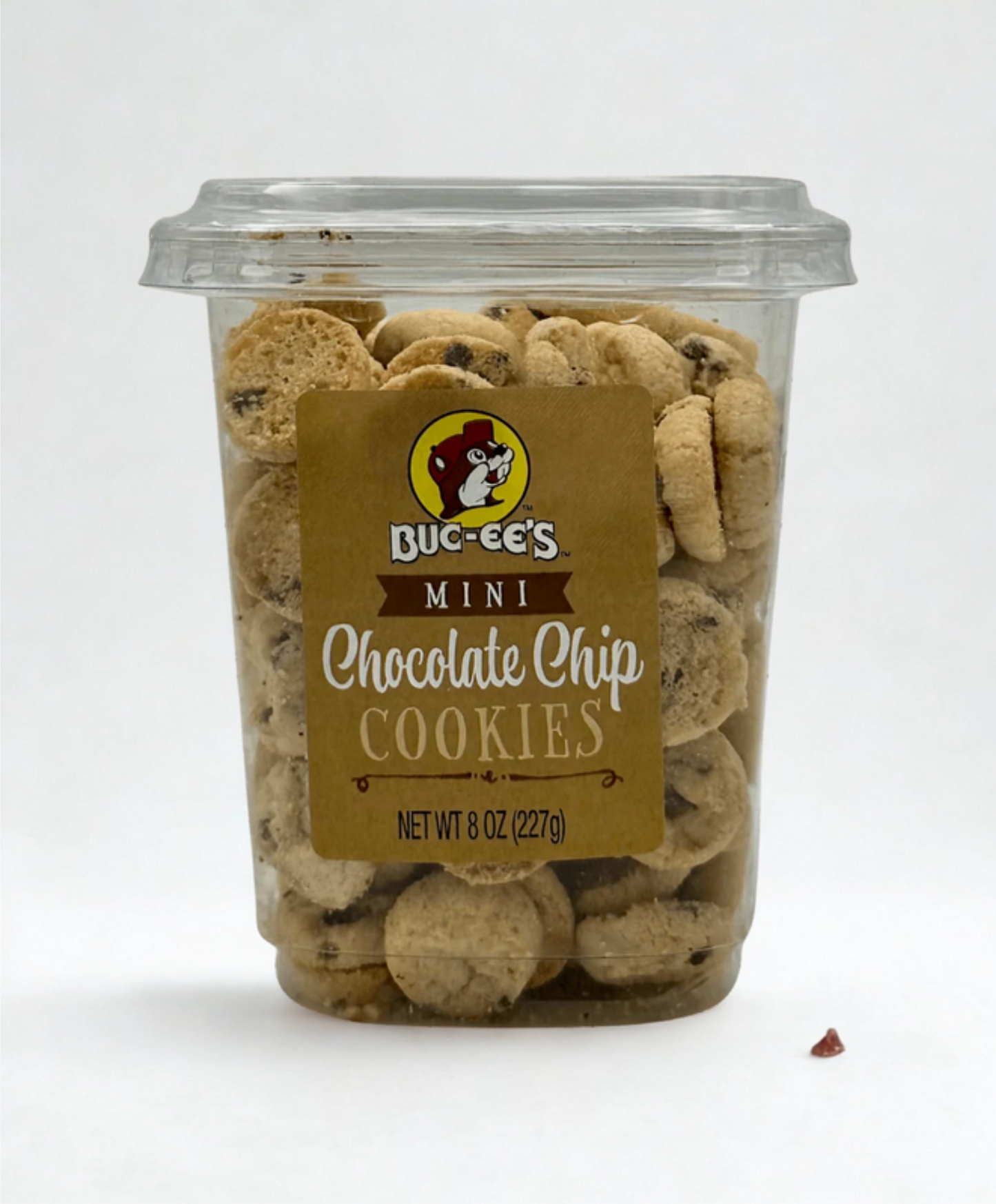 Container of Buc-ee's Mini Chocolate Chip Cookies on a wooden surface