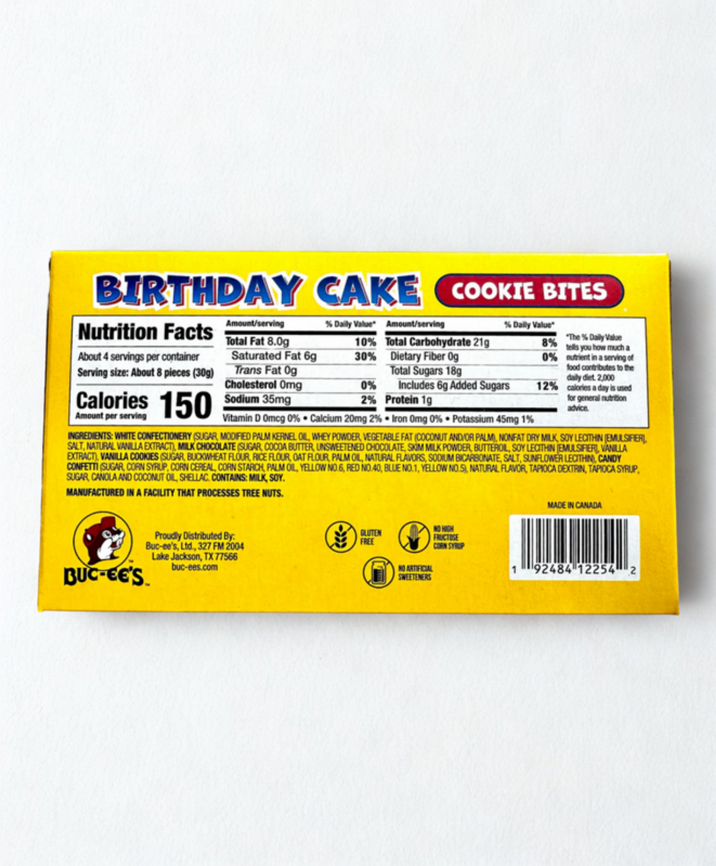 Box of Buc-ee's Birthday Cake Cookie Bites on a wooden surface