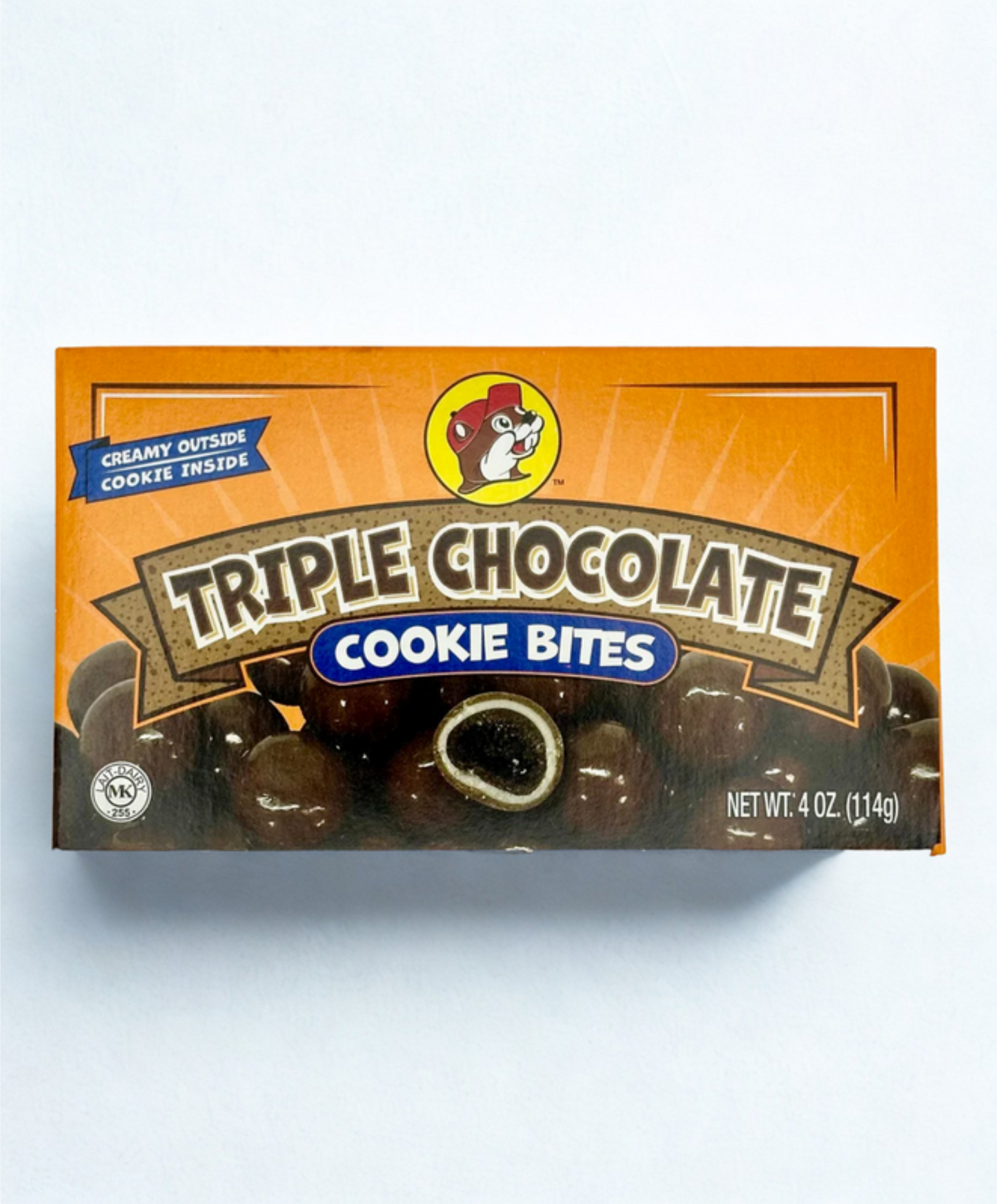 Box of Triple Chocolate Cookie Bites on a wooden surface