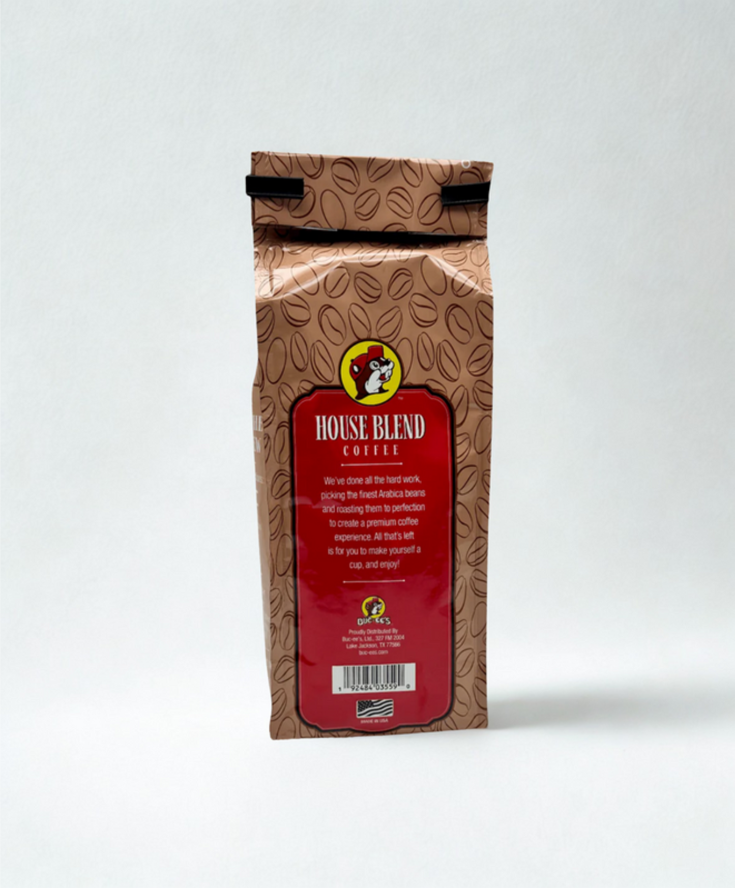 Coffee bag labeled 'House Blend Coffee' on a wooden surface