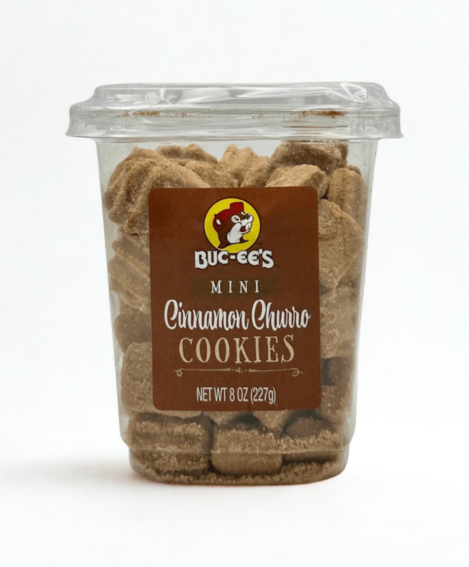 Container of Bucée's Mini Cinnamon Churro Cookies on a wooden surface