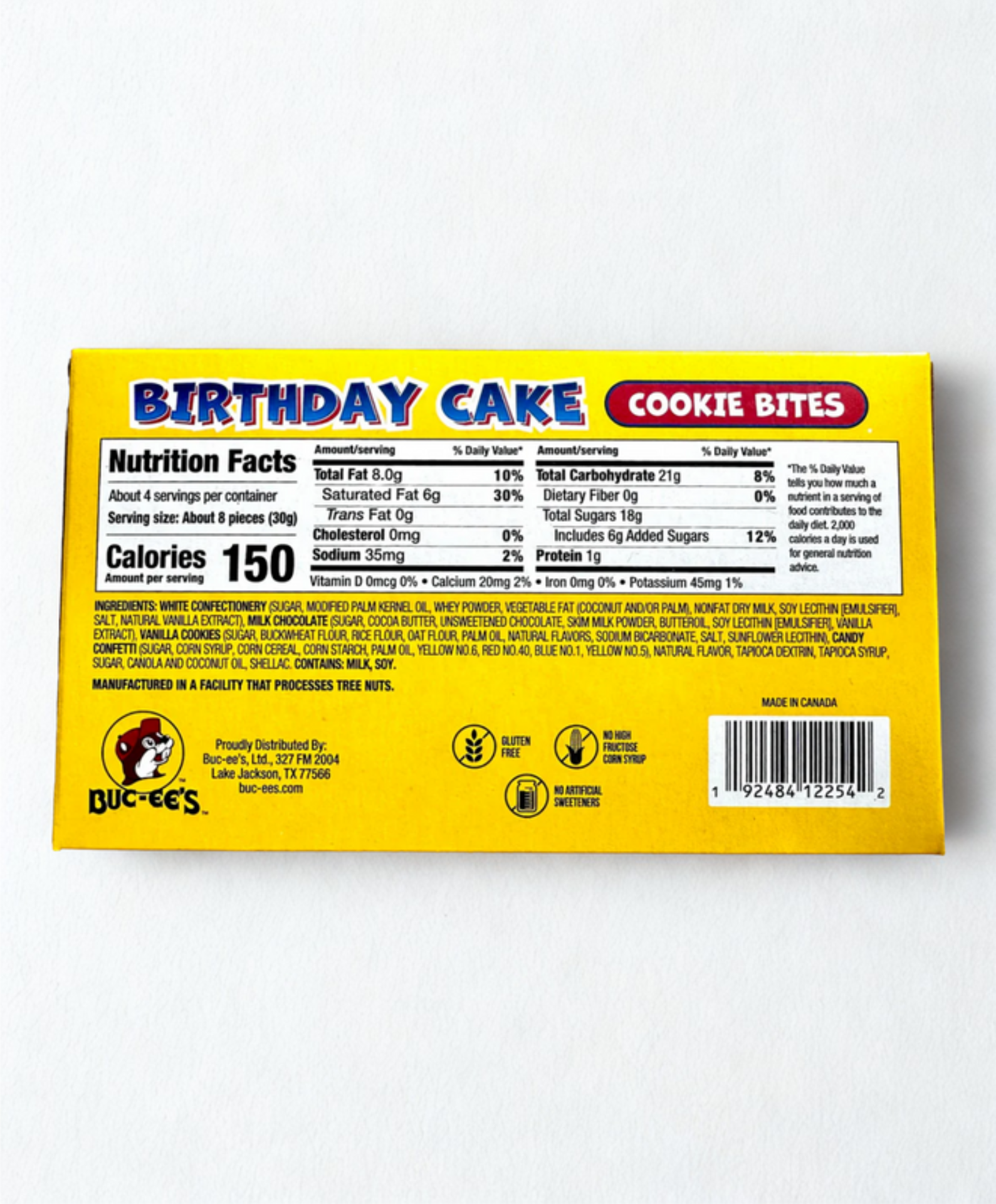 Box of Buc-ee's Birthday Cake Cookie Bites on a wooden surface