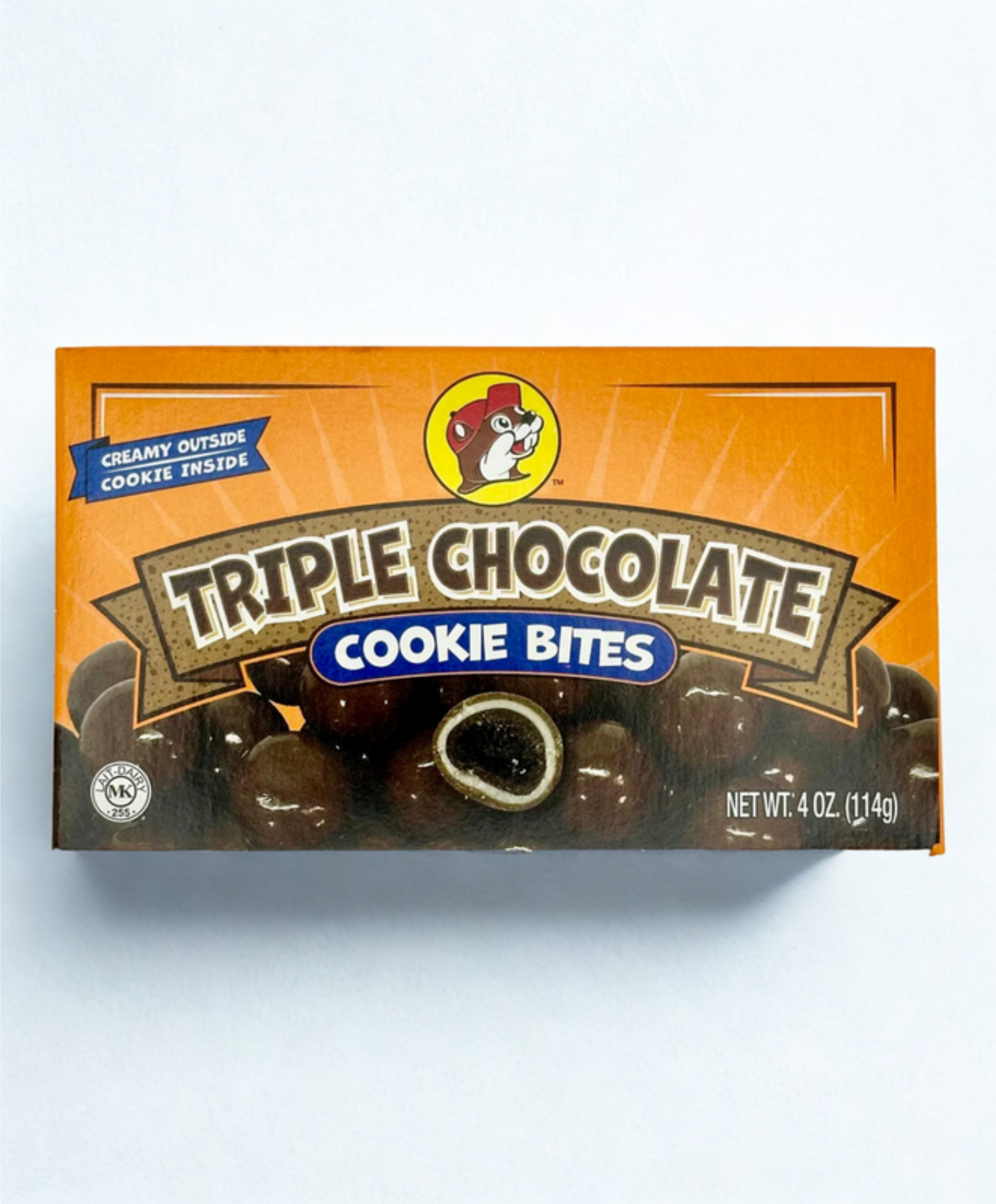 Box of Triple Chocolate Cookie Bites on a wooden surface
