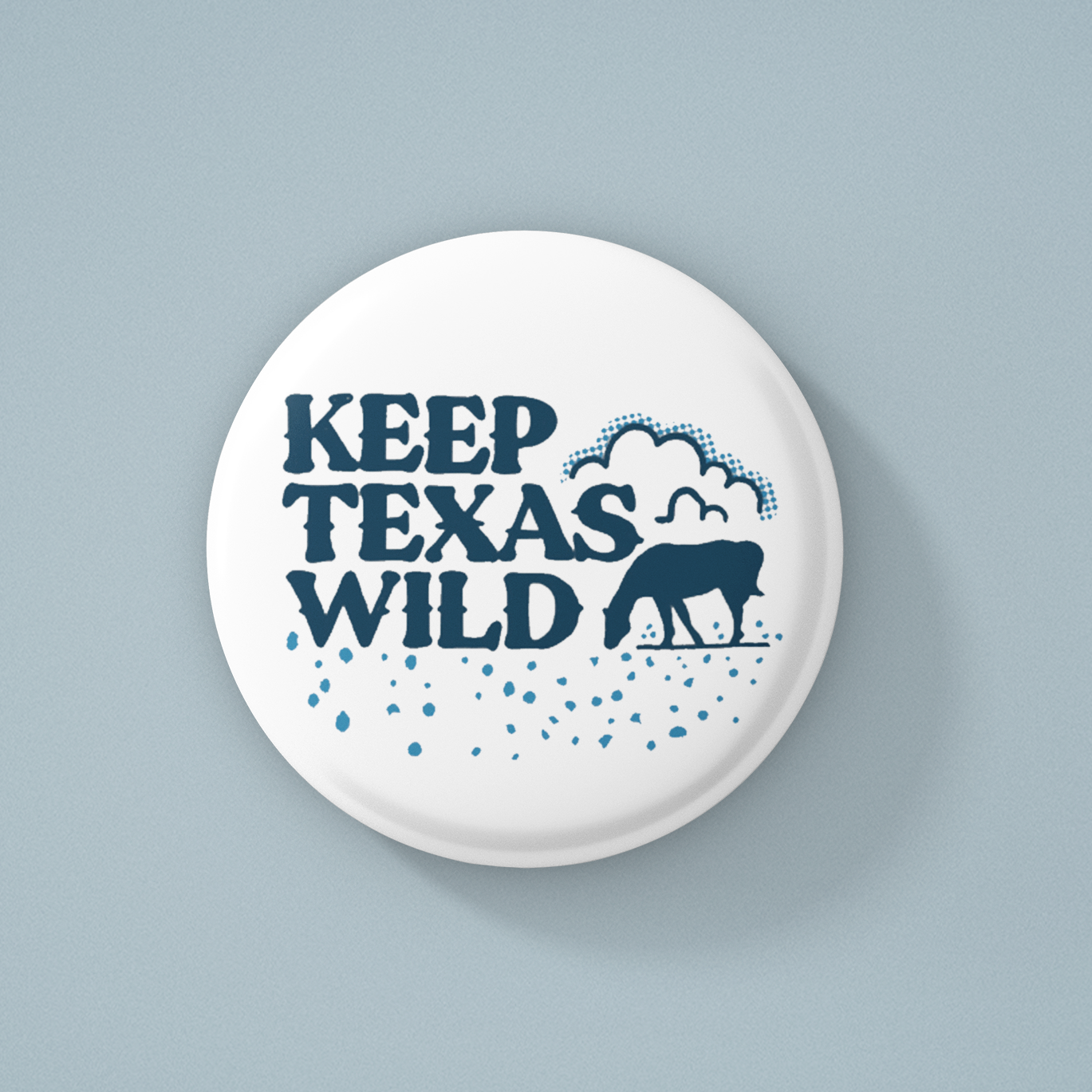 Button with 'Keep Texas Wild' text and a bear graphic on a light gray background
