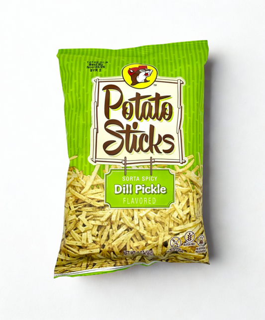 Bag of dill pickle flavored potato sticks on a wooden surface