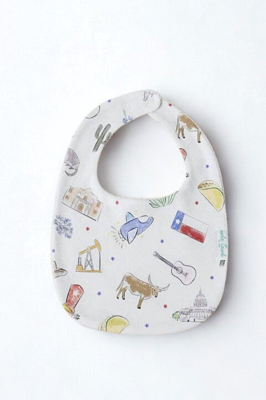 Baby bib with colorful patterns on a beige background